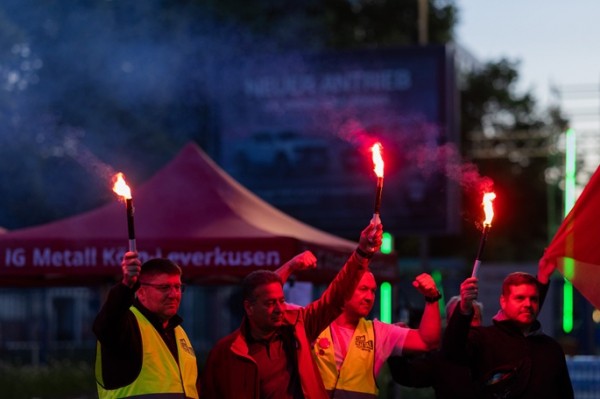Ford workers in Germany strike over planned job cuts Ford workers in Germany strike over planned job cuts