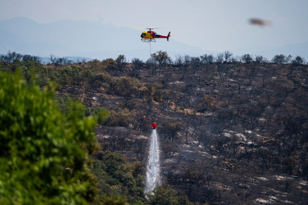 Wildfires prompt evacuations, suspend trains in Spain Wildfires prompt evacuations, suspend trains in Spain