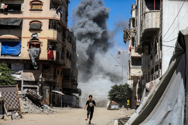 Israel strikes residential towers in Gaza, killing 7 Palestinians Israel strikes residential towers in Gaza, killing 7 Palestinians