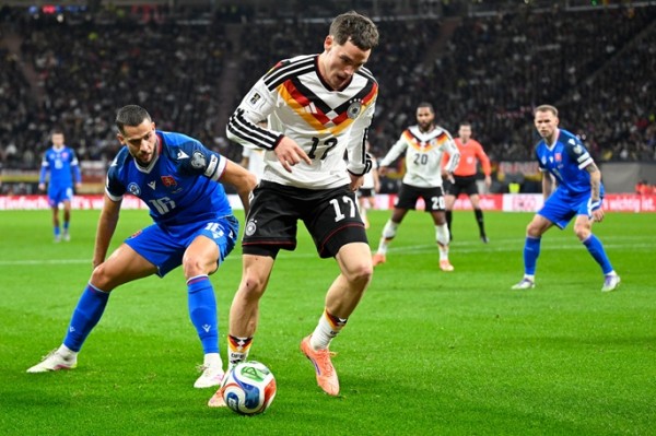 Germany crush Slovakia to seal World Cup berth Germany crush Slovakia to seal World Cup berth